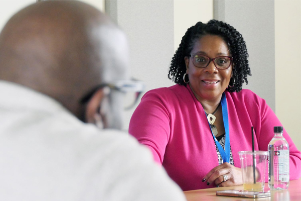 PhD in African American Preaching and Sacred Rhetoric - Rev. Dr. Buggs talking with a student