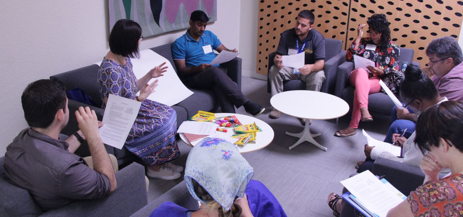 School of Counseling -A group of students having a conversation.