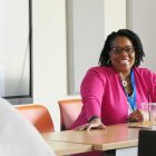 Dr. Courtney Buggs teaching the PhD class