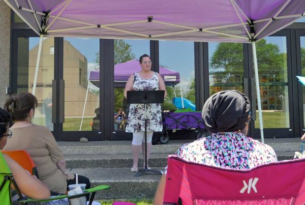 Student preaches during a tent revival class