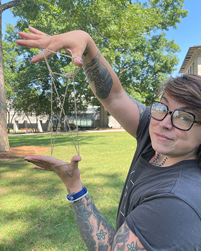 CTS student Tyne Parlett relaxes outdoors during the 2023 Summer Session of the Hispanic Summer Program.