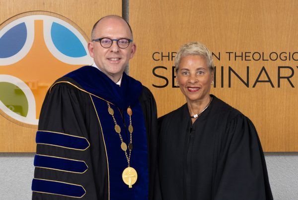 President David Mellott and a member of the trustees pose for a photo after Convocation